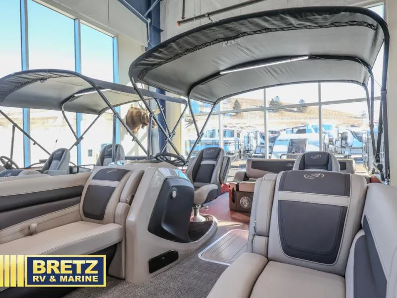 Slide: The Image of 2025 Cabrio Ultra-Lounge 22UC interior at Bretz RV & Marine showroom. - 7