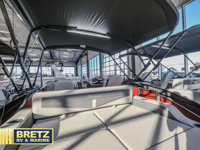 Slide: The Image of 2025 Cabrio Ultra-Lounge 22UC boat interior at Bretz RV & Marine showroom. - 8