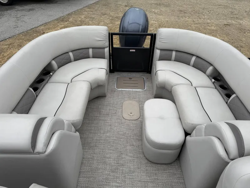 Slide: The Image of 2017 Bennington 226 GSR pontoon boat interior with plush seating and cup holders. - 8