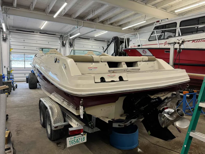 Slide: The Image of 2007 Sea Ray 230 Select boat on trailer in garage setting. - 3