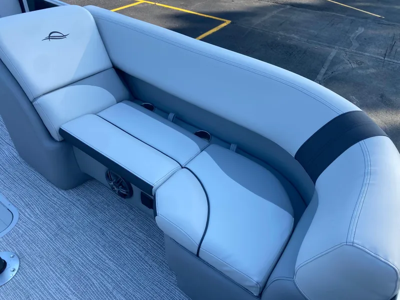 Slide: The Image of 2025 SunCatcher Select 322RC boat seating with sleek, modern design and comfortable upholstery. - 10