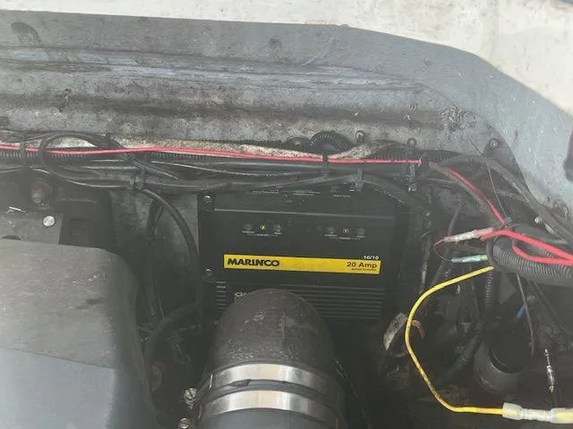 Slide: The Image of Engine compartment of 2003 Seaswirl Striper 2601 Walkaround I/O with Marinco 20 Amp charger. - 19