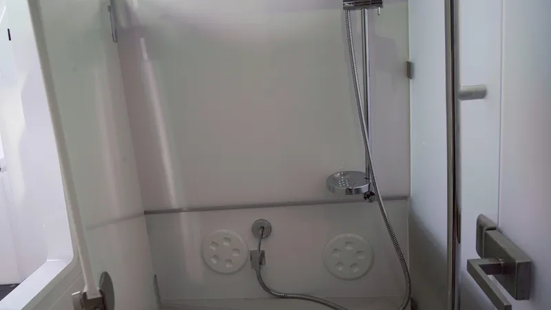 Slide: The Image of Shower area in 2023 Axopar 37 XC CROSS CABIN boat. - 39
