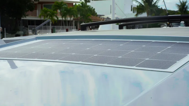 Slide: The Image of 2023 Axopar 37 XC CROSS CABIN with solar panel on the roof. - 45