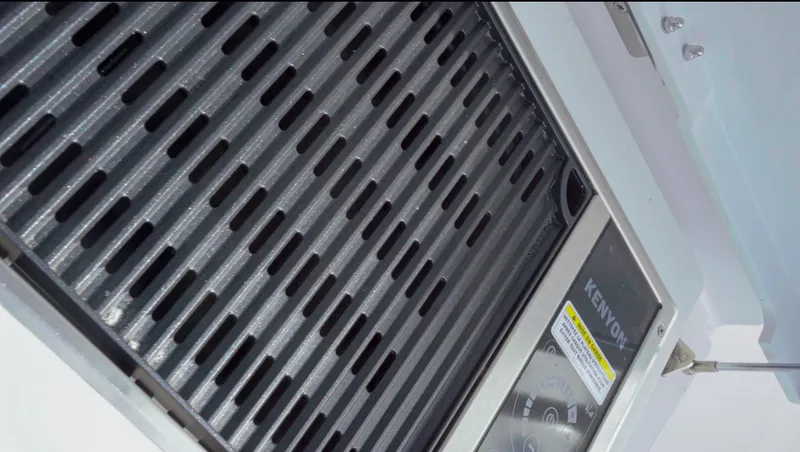 Slide: The Image of Grill detail on 2023 Axopar 37 XC CROSS CABIN boat. - 9