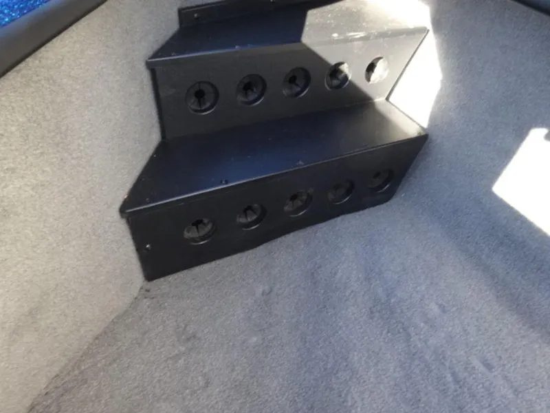 Slide: The Image of 2023 Nitro Z18 boat interior with rod storage compartments. - 12