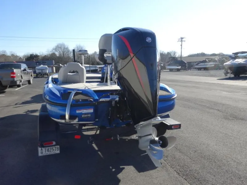 Slide: The Image of 2023 Nitro Z18 boat with powerful outboard motor, parked on a sunny day. - 6