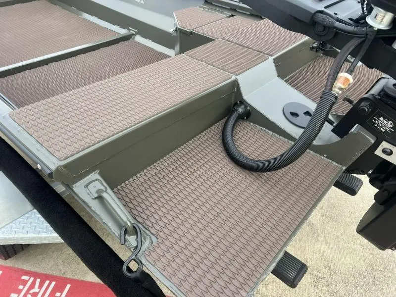 Slide: The Image of 2025 Gator Tail 17/48 Gator Series boat deck with textured flooring and wiring. - 13