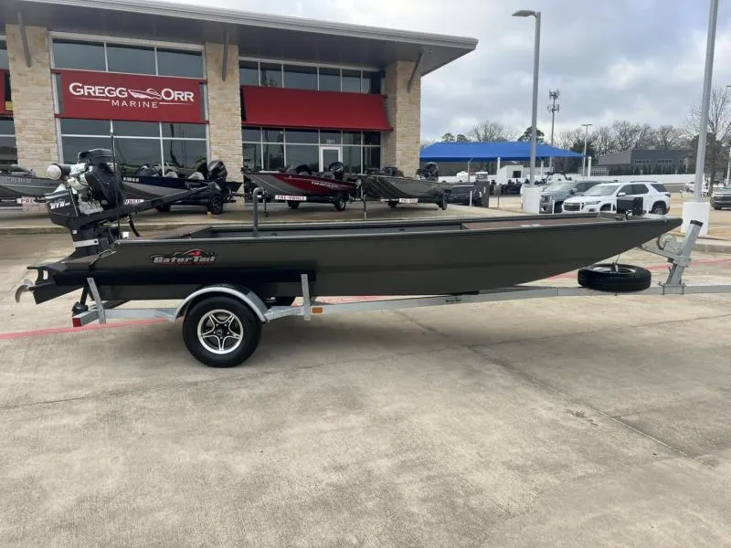 Slide: The Image of 2025 Gator Tail 17/48 Gator Series boat on trailer at dealership. - 2