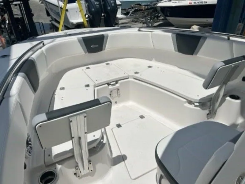 Slide: The Image of 2025 Robalo R270 Center Console boat interior with seating and storage compartments. - 14