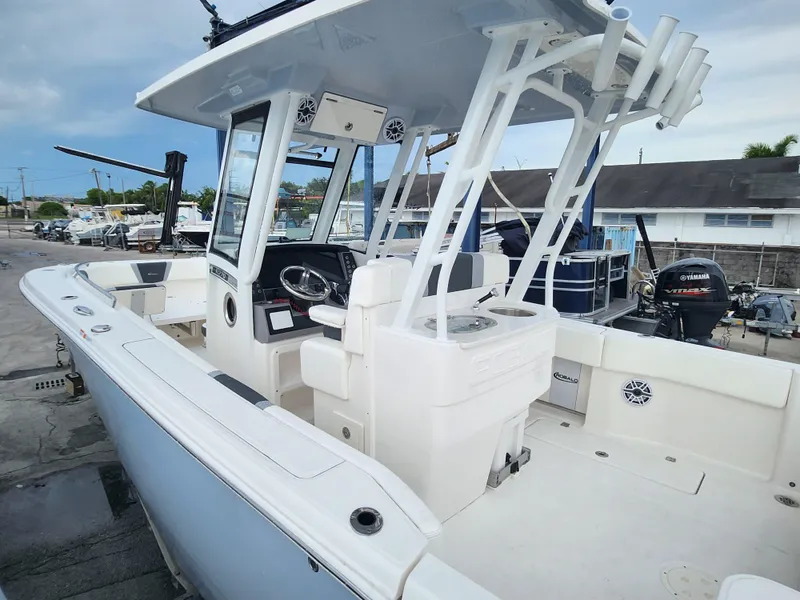 Slide: The Image of 2025 Robalo R270 Center Console boat with sleek design and modern features. - 24
