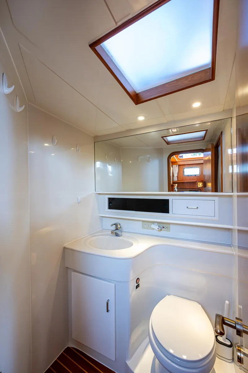 Slide: The Image of Luxurious bathroom in 2002 Symbol 42' yacht with skylight and modern fixtures. - 26