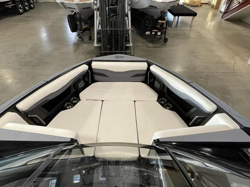 Slide: The Image of 2025 Axis T220 boat interior with spacious seating and modern design. - 19