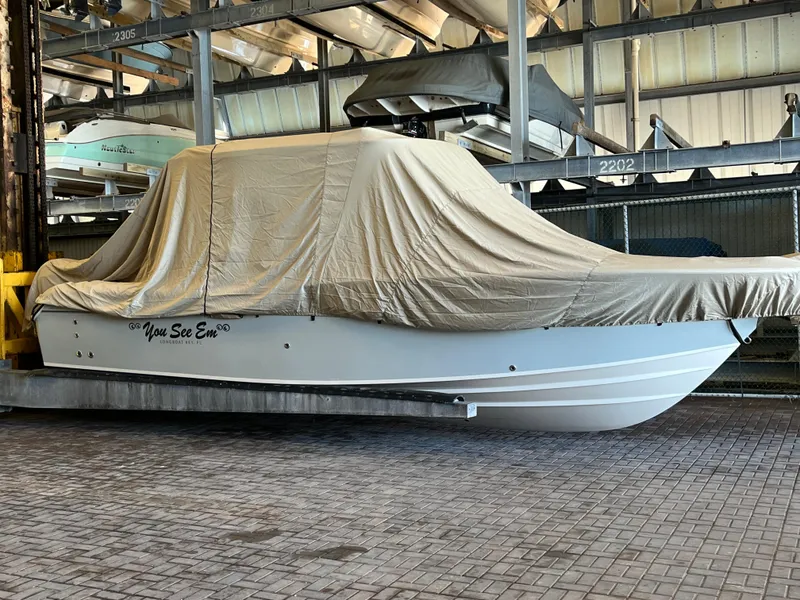 Slide: The Image of 2023 Grady-White Freedom 275 boat covered in storage, Longboat Key, FL. - 11