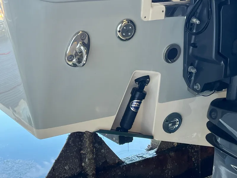 Slide: The Image of 2023 Grady-White Freedom 275 boat stern with trim tab and hydraulic system. - 21