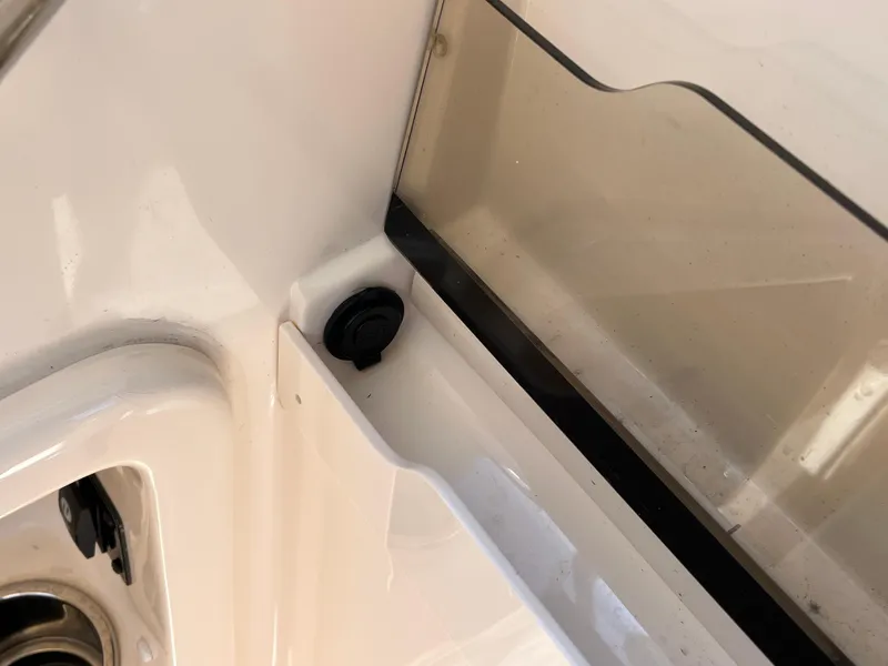 Slide: The Image of 2023 Grady-White Freedom 275 boat interior detail, showcasing sleek design and craftsmanship. - 26