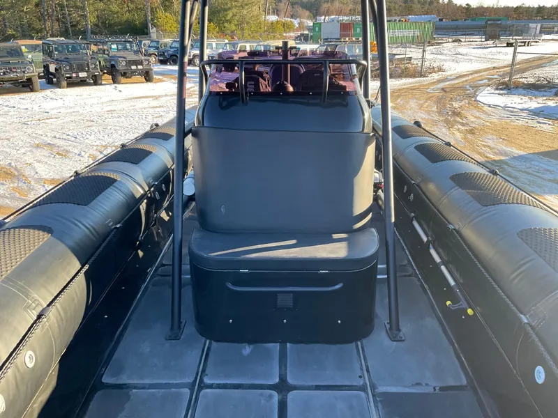 Slide: The Image of 2017 Ocean Craft Marine 9.5 M boat interior with seating and control console. - 15