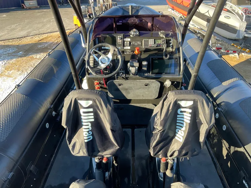 Slide: The Image of Cockpit of 2017 Ocean Craft Marine 9.5 M boat with Ullman seats and navigation controls. - 22