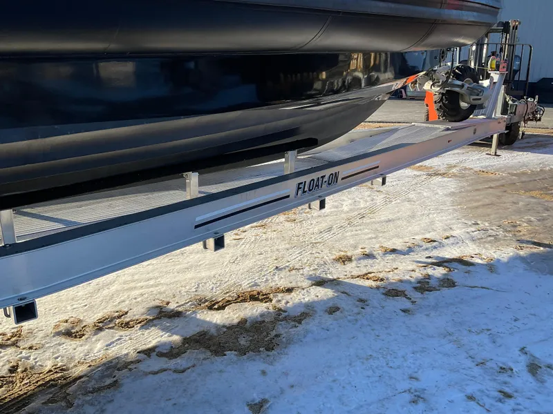 Slide: The Image of Ocean Craft Marine 9.5 M boat on a trailer, snowy ground, 2017 model. - 26