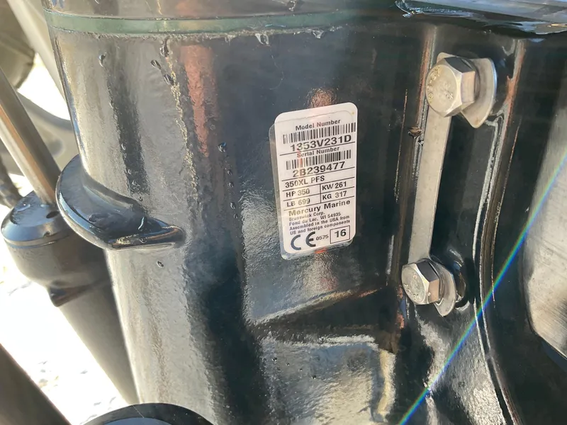 Slide: The Image of Close-up of a 2017 Ocean Craft Marine 9.5 M model number label on a metal surface. - 4