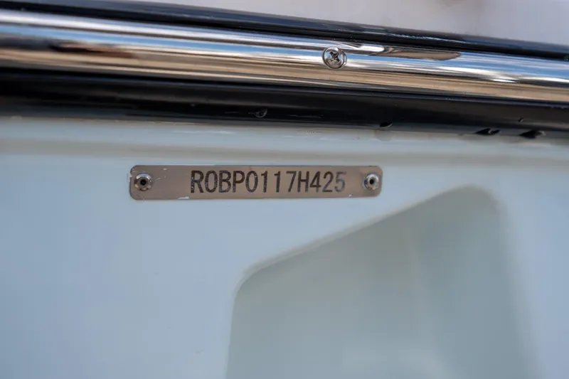 Slide: The Image of 2025 Robalo R230 Center Console boat identification plate with serial number. - 16