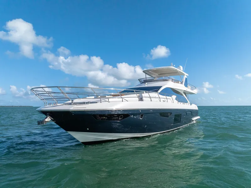 Slide: The Image of Azimut Fly 72 yacht, 2016 model, cruising on open sea under clear blue sky. - 20