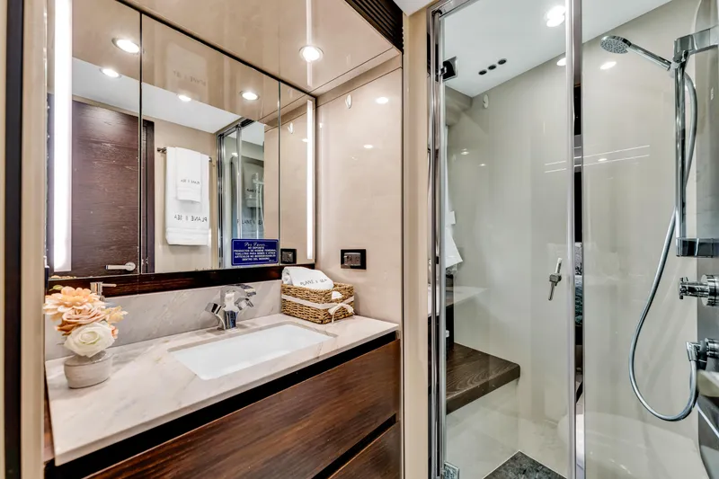 Slide: The Image of Luxurious bathroom in 2016 Azimut Fly 72 yacht with modern fixtures and elegant design. - 28