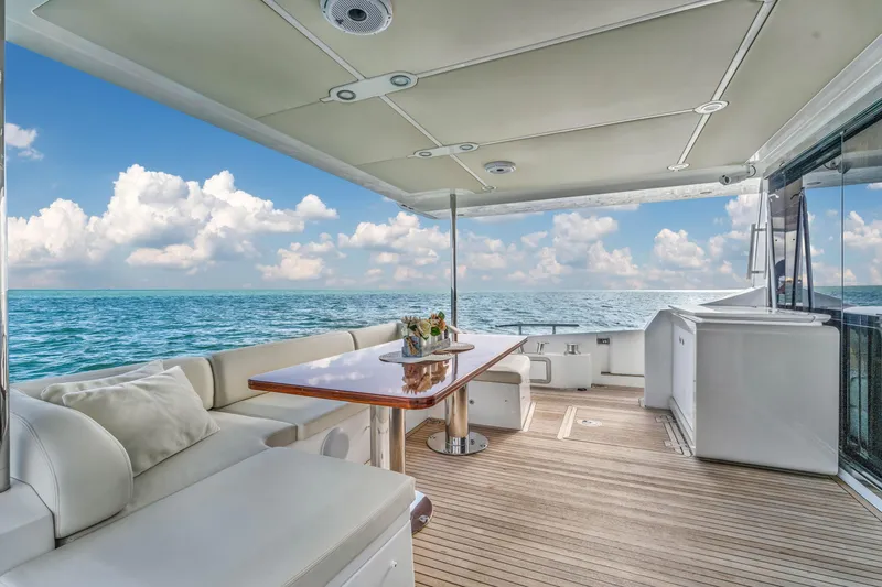 Slide: The Image of Azimut Fly 72 yacht deck, 2016 model, with ocean view and luxurious seating. - 4