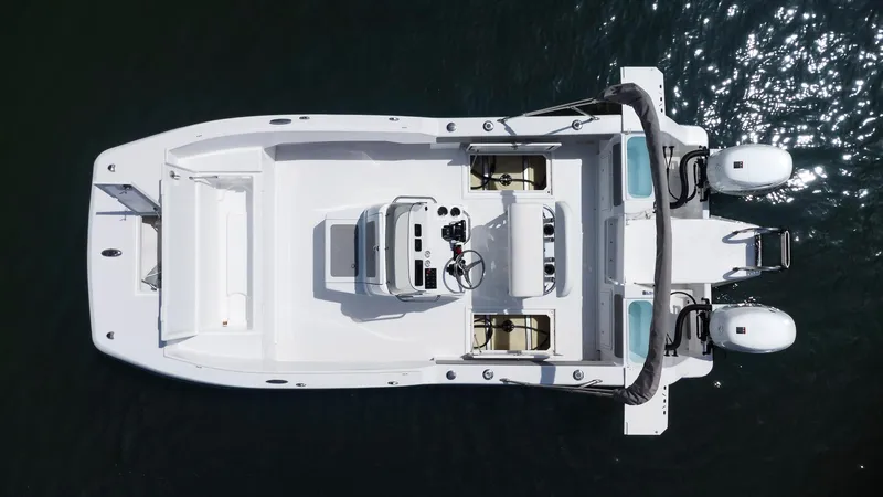 Slide: The Image of Aerial view of 2025 ArrowCat 20 CC boat with dual engines on water. - 8