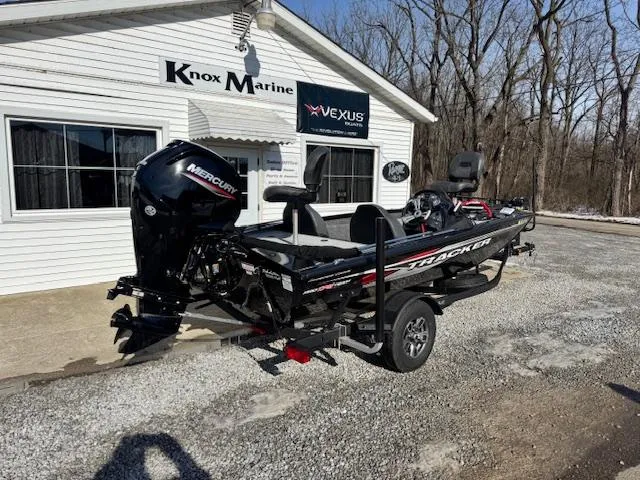 Slide: The Image of 2024 Bass Tracker Pro Team 175 boat outside Knox Marine dealership. - 3