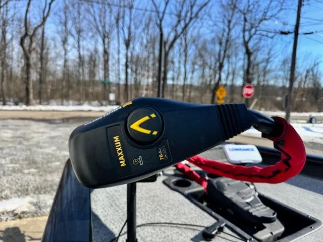 Slide: The Image of Close-up of a Maxxum trolling motor on a 2024 Bass Tracker Pro Team 175 boat. - 8