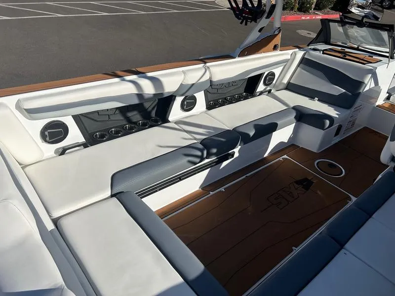 Slide: The Image of 2025 Axis T250 boat interior with white seating and modern design. - 10
