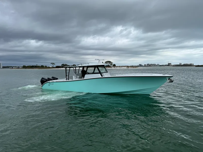 Slide: The Image of 2023 Yellowfin 42 Offshore boat cruising on a cloudy day. - 3