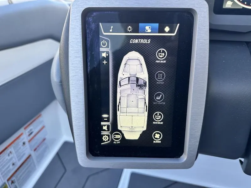 Slide: The Image of 2024 Malibu 21 LX-R boat control panel display with navigation and settings options. - 16