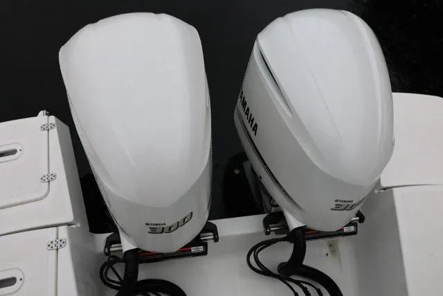 Slide: The Image of Twin Yamaha 300 outboard engines on a 2021 Four Winns V355 Coupe boat. - 15