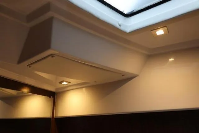 Slide: The Image of Interior ceiling of 2021 Four Winns V355 Coupe with recessed lighting. - 59