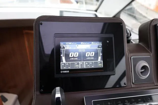 Slide: The Image of Yamaha display on 2021 Four Winns V355 Coupe dashboard, showing engine metrics. - 85