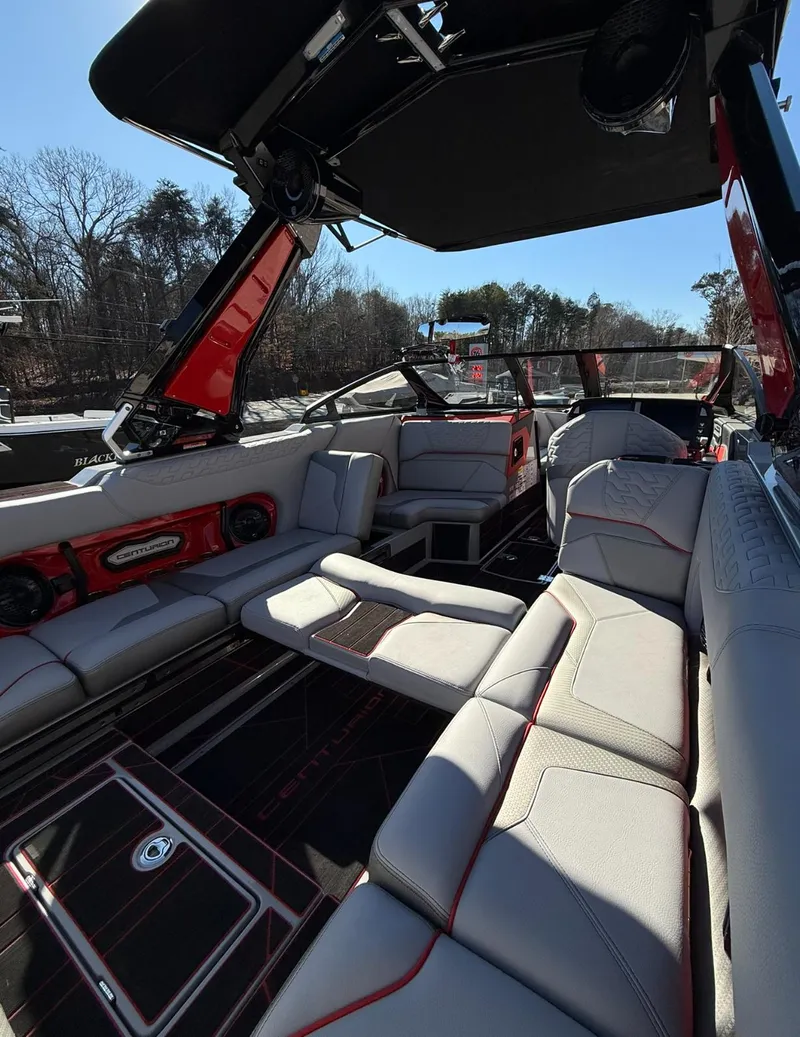 Slide: The Image of Interior of 2025 Centurion Ri245 boat with luxurious seating and modern design. - 13