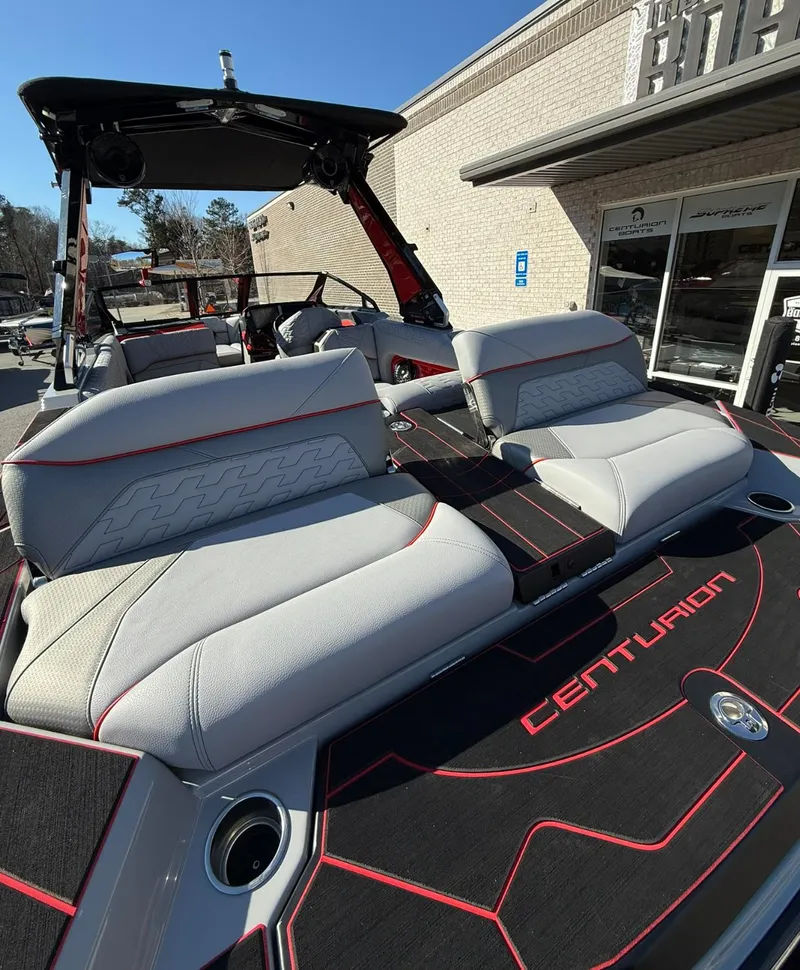Slide: The Image of 2025 Centurion Ri245 boat with sleek seating and modern design. - 16