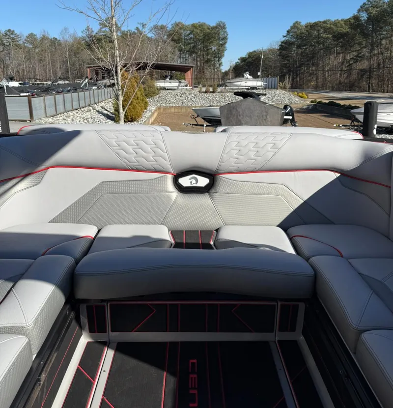Slide: The Image of 2025 Centurion Ri245 boat interior with modern seating and sleek design. - 19