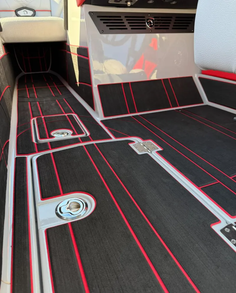 Slide: The Image of 2025 Centurion Ri245 interior with sleek black and red flooring design. - 20