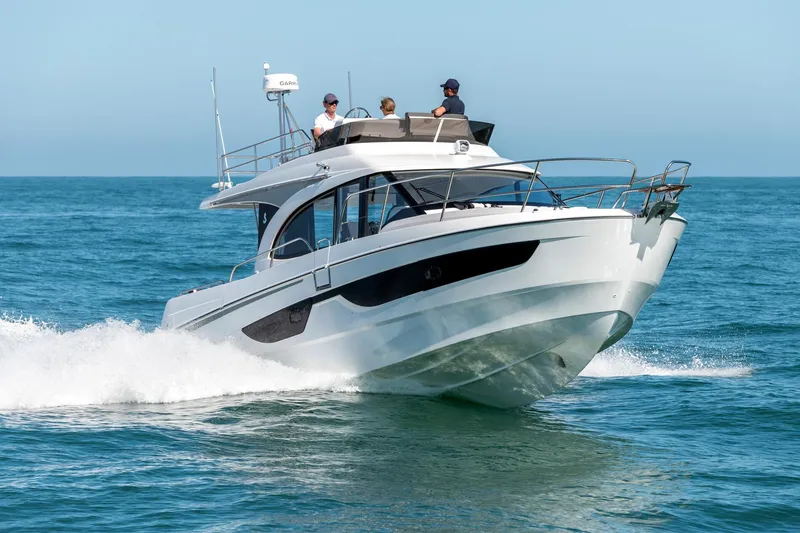 Slide: The Image of 2025 Beneteau Antares 11 Fly cruising on open water, showcasing sleek design and performance. - 22
