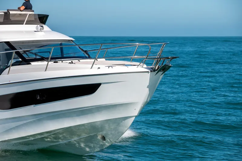 Slide: The Image of 2025 Beneteau Antares 11 Fly yacht cruising on open sea. - 23