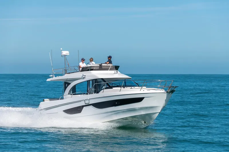 Slide: The Image of 2025 Beneteau Antares 11 Fly cruising on open water, showcasing sleek design and performance. - 24