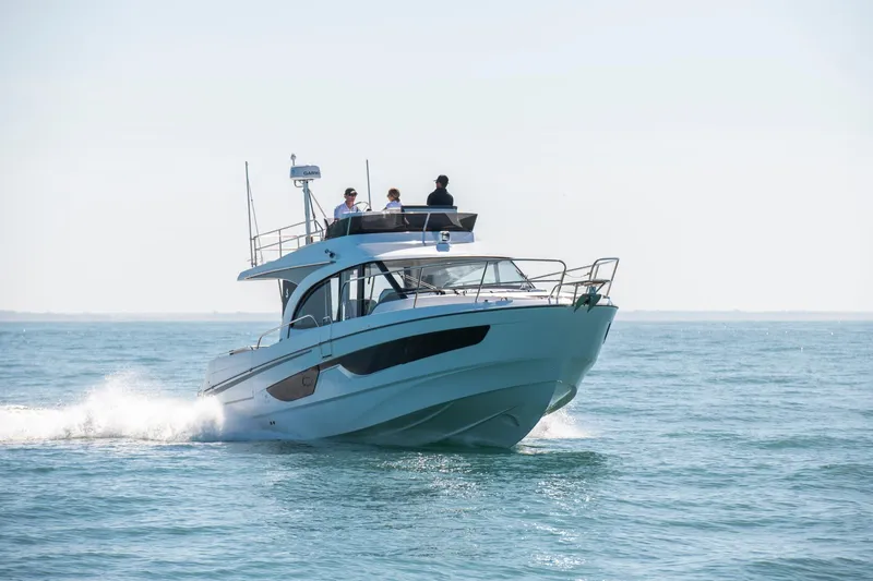 Slide: The Image of 2025 Beneteau Antares 11 Fly cruising on open water, showcasing sleek design and performance. - 25