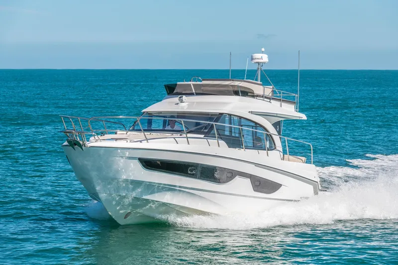 Slide: The Image of 2025 Beneteau Antares 11 Fly cruising on open sea, showcasing sleek design and performance. - 27