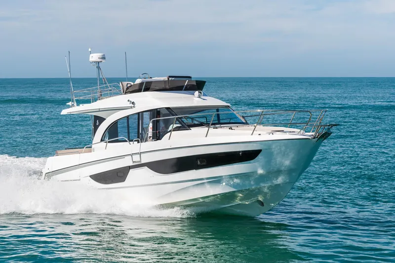 Slide: The Image of 2025 Beneteau Antares 11 Fly cruising on open sea, showcasing sleek design and modern features. - 28