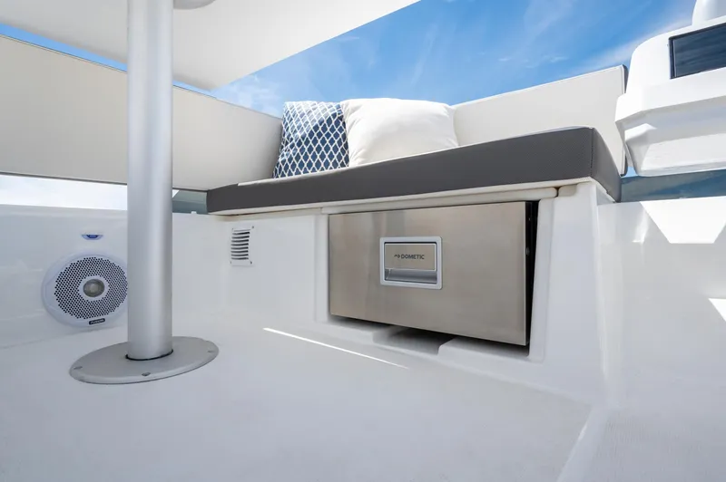 Slide: The Image of 2025 Beneteau Antares 11 Fly interior with seating, storage, and modern design elements. - 9