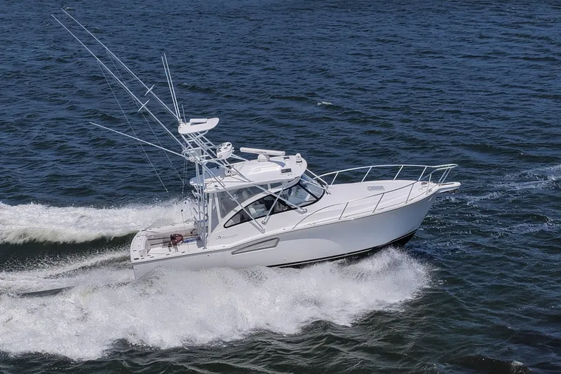 Slide: The Image of 2022 Albemarle 360 Express Fisherman cruising on open water. - 17