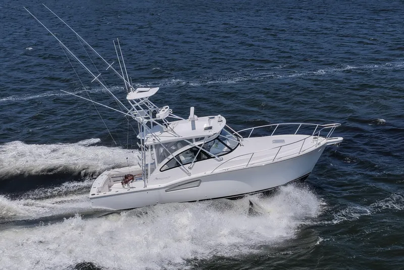 Slide: The Image of 2022 Albemarle 360 Express Fisherman cruising on open water, showcasing sleek design and performance. - 18